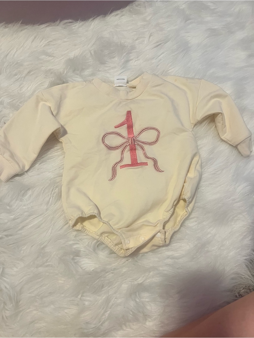 Baby girl 1 romper with bow. Size 6/12 months